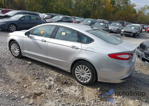 2013 Ford Fusion Hybrid Se z USA, uszkodzony, nr VIN 3FA6P0LUXDR115933